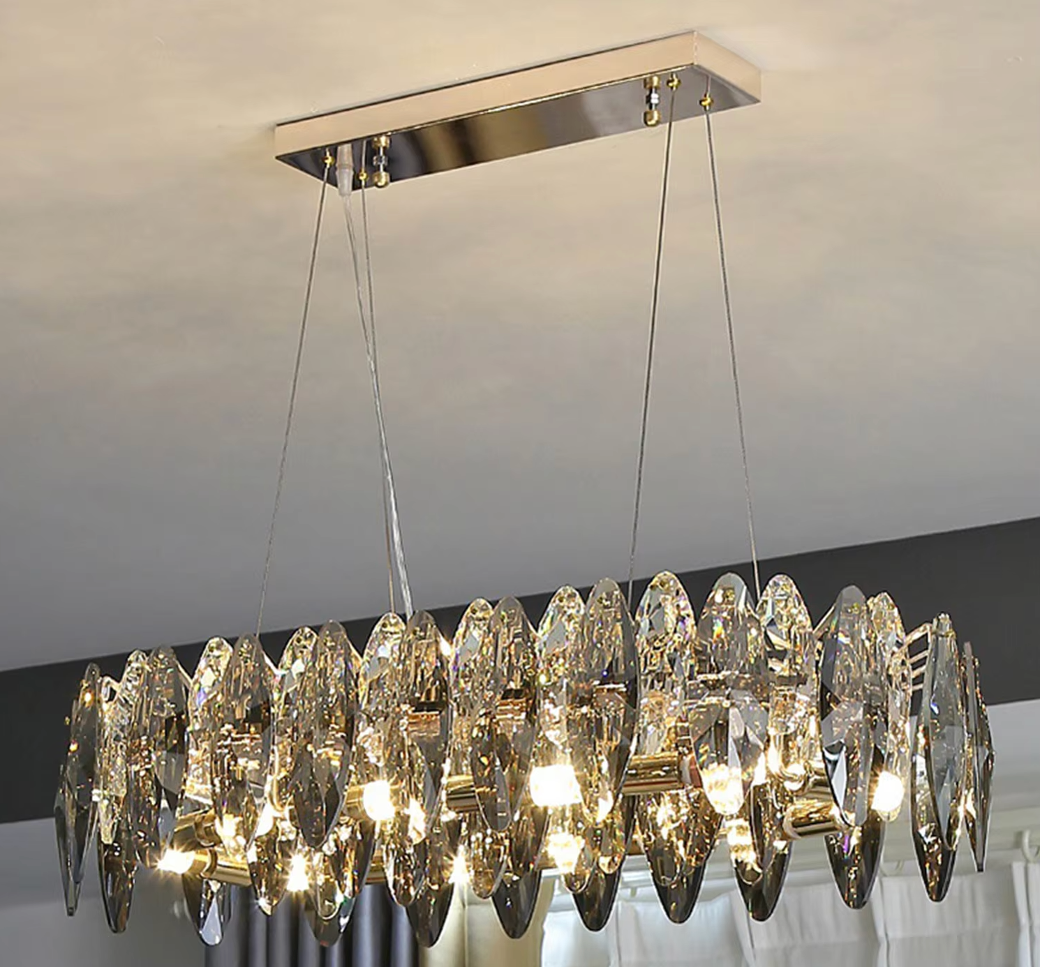 Luxury gold crystal chandelier with round pendant design for dining and living spaces