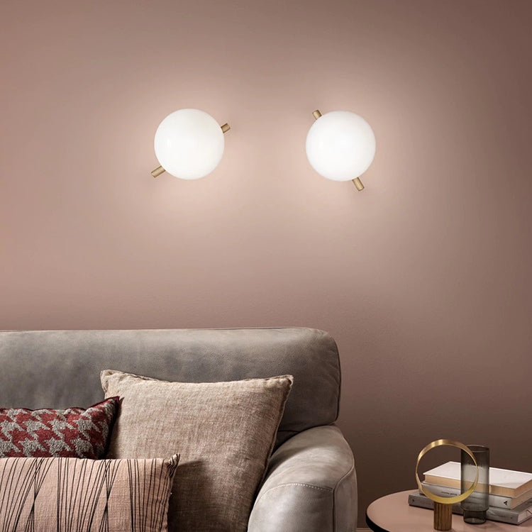 Modern gold and white LED wall lamp with glass shade for bedroom and living room